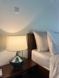 Postel nebo postele na pokoji v ubytování Maho Boutique Hotel