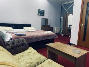 Postel nebo postele na pokoji v ubytování Ekm Hotel