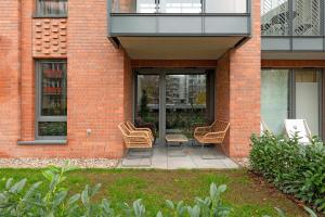Vonkajšia záhrada v ubytovaní SCALA City Center by Downtown Apartments + 37 fotografií