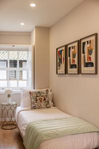 Postel nebo postele na pokoji v ubytování Casa do Solar by VinteOito