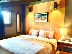 a bedroom with a large bed in a room at Big Sky Bungalow in Big Sky +54 photos