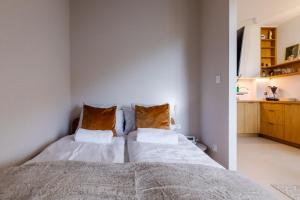 Ένα ή περισσότερα κρεβάτια σε δωμάτιο στο Daj Sobie Spokój Mariental