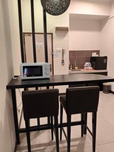 Kuchyň nebo kuchyňský kout v ubytování Homestay B-Lagoon Ayer Keroh by AlliEyka 2