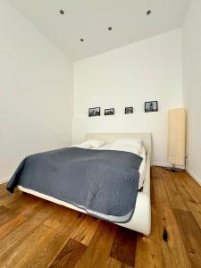Łóżko lub łóżka w pokoju w obiekcie REMA Apartments 1080
