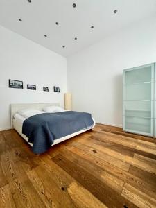 Łóżko lub łóżka w pokoju w obiekcie REMA Apartments 1080