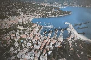 an aerial view of a city with a harbor at Suites Margot in Santa Margherita Ligure