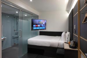 Voodi või voodid majutusasutuse The Z Hotel Piccadilly toas
