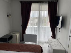 TV a/nebo společenská místnost v ubytování Paradise Loft + 37 fotografií