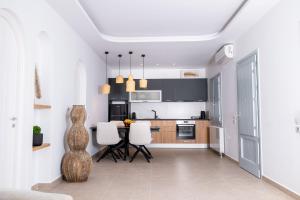 A kitchen or kitchenette at SN Santorini Apartments