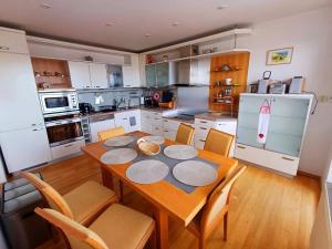 Kuchyň nebo kuchyňský kout v ubytování Apartmán Gerlach - 4 balconies mountain view + 10 fotografií
