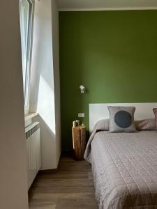 Postel nebo postele na pokoji v ubytování Verde Rifugio