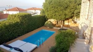 The swimming pool at or close to FEEL LIKE HOME IN LESVOS