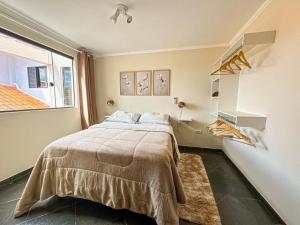 Cama ou camas em um quarto em Sobrado Aconchegante e Espaçoso mais 36 fotos