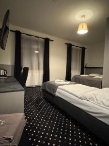Posteľ alebo postele v izbe v ubytovaní Medical Wellness & SPA Werona