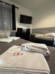 Posteľ alebo postele v izbe v ubytovaní Medical Wellness & SPA Werona