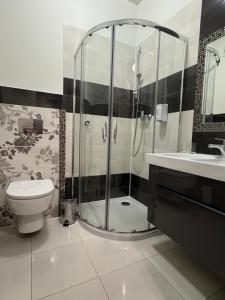 Kúpeľňa v ubytovaní Medical Wellness & SPA Werona