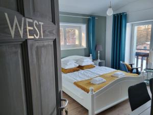Postel nebo postele na pokoji v ubytování Orańska
