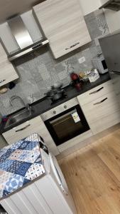 Kuchyňa alebo kuchynka v ubytovaní Moretti Home