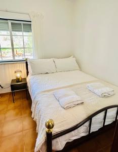Postel nebo postele na pokoji v ubytování Casa Martins Country Apt No 4 + 12 fotografií