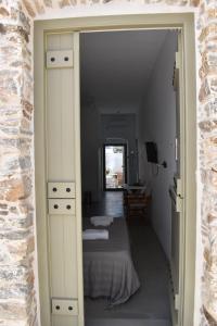 Katil atau katil-katil dalam bilik di Chora Cozy Studios - Kythnos