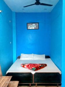 Postel nebo postele na pokoji v ubytování RELAX PAYING GUEST HOUSE