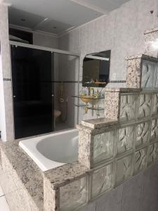 Koupelna v ubytování Aconchego by the lagoon