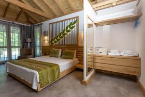 Postel nebo postele na pokoji v ubytování Gizli Cennet Villages Hotel + 37 fotografií