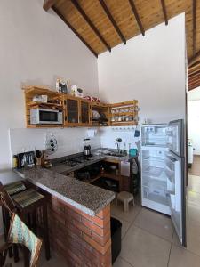 Η κουζίνα ή μικρή κουζίνα στο Apartamento completo en Curití - Yuriky