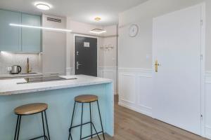 Η κουζίνα ή μικρή κουζίνα στο Nowoczesny apartament z balkonem i widokiem na miasto