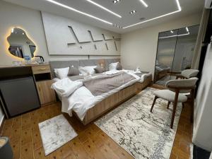 Кровать или кровати в номере Camel Pyramids View Inn