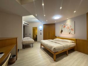 Postel nebo postele na pokoji v ubytování Motel Soignè