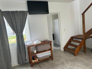 Et tv og/eller underholdning på Complejo Las Cabañas del Lago