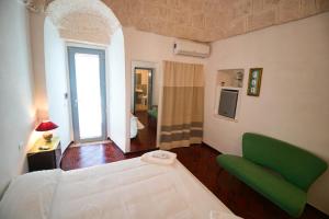 Voodi või voodid majutusasutuse Masseria Trullo Sovrano Exclusive B&B toas