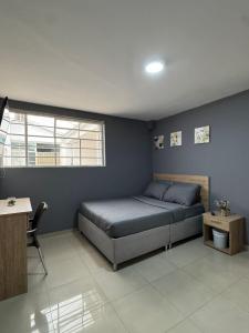 A bed or beds in a room at Hostelfc San Luis