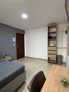 A bed or beds in a room at Hostelfc San Luis