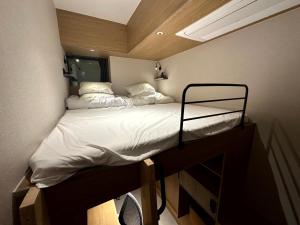 Postel nebo postele na pokoji v ubytování Nomad Live Hostel