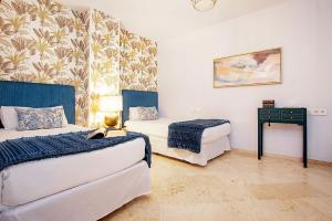 Posteľ alebo postele v izbe v ubytovaní Genteel Home Tablas