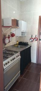 Kuchyň nebo kuchyňský kout v ubytování Mágica Suites