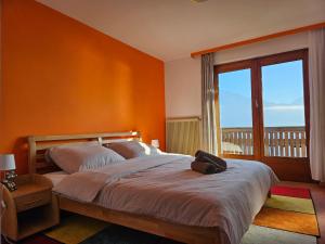 Postel nebo postele na pokoji v ubytování Pension Sonnhof Attersee + 37 fotografií