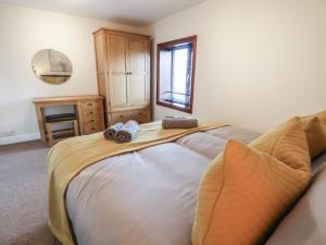 Postel nebo postele na pokoji v ubytování Quayside Apartment