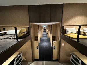 Postel nebo postele na pokoji v ubytování Nomad Live Hostel