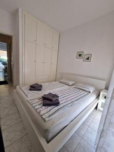 Ein Bett oder Betten in einem Zimmer der Unterkunft Cozy Sun