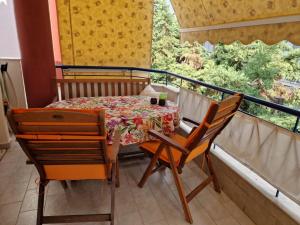 Ein Balkon oder eine Terrasse in der Unterkunft Cozy Sun