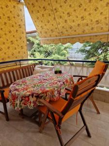Ein Balkon oder eine Terrasse in der Unterkunft Cozy Sun