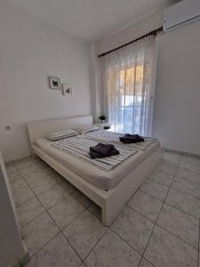 Ein Bett oder Betten in einem Zimmer der Unterkunft Cozy Sun
