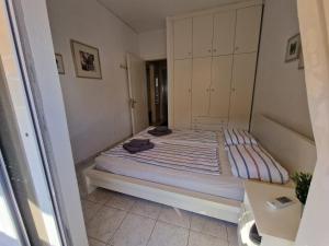 Ein Bett oder Betten in einem Zimmer der Unterkunft Cozy Sun
