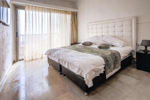 Postel nebo postele na pokoji v ubytování Hotel Blue Weiss