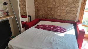 A bed or beds in a room at apartemento rural