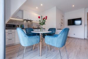 Kuchyňa alebo kuchynka v ubytovaní Gąsienica Apartamenty Queen