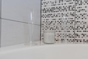 Kúpeľňa v ubytovaní Gąsienica Apartamenty Queen